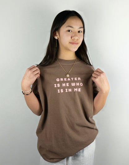 GREATER IS HE TEE